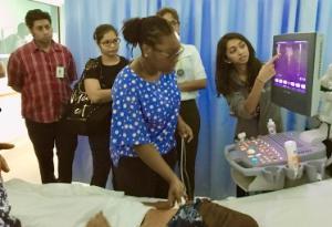 Emergency Medicine students study a monitor