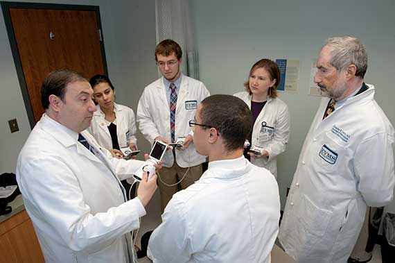 Drs. Abuhamad and Levitov with students.