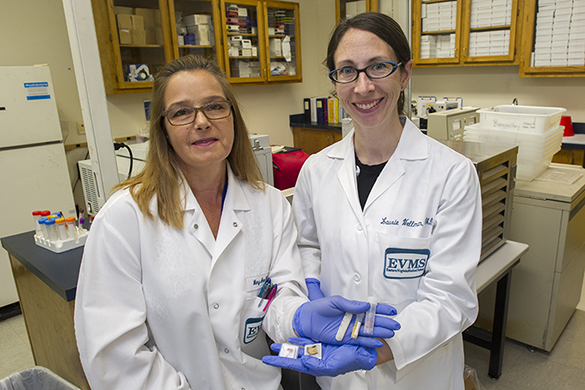 Dr. Laurie Wellman and Mary Ann Clements present specimens in the EVMS Biorepository.