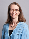 Mary Margaret Gleason, MD, smiles at the camera wearing a blue sweater.