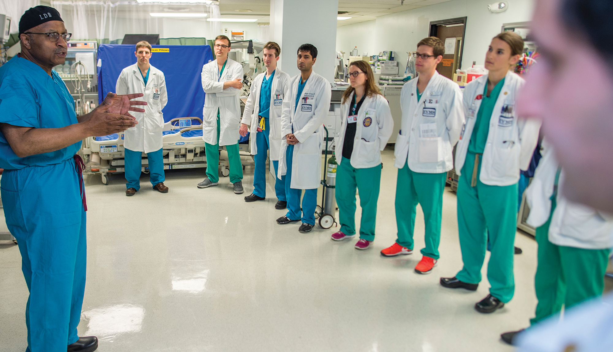 Dr. Britt works with a group of residents at Sentara Norfolk General Hospital in 2016.